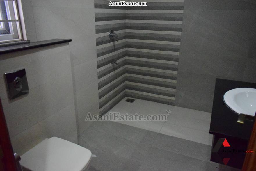 Basement Bathroom 50x90 feet 1 Kanal portion for rent Islamabad sector E 11 